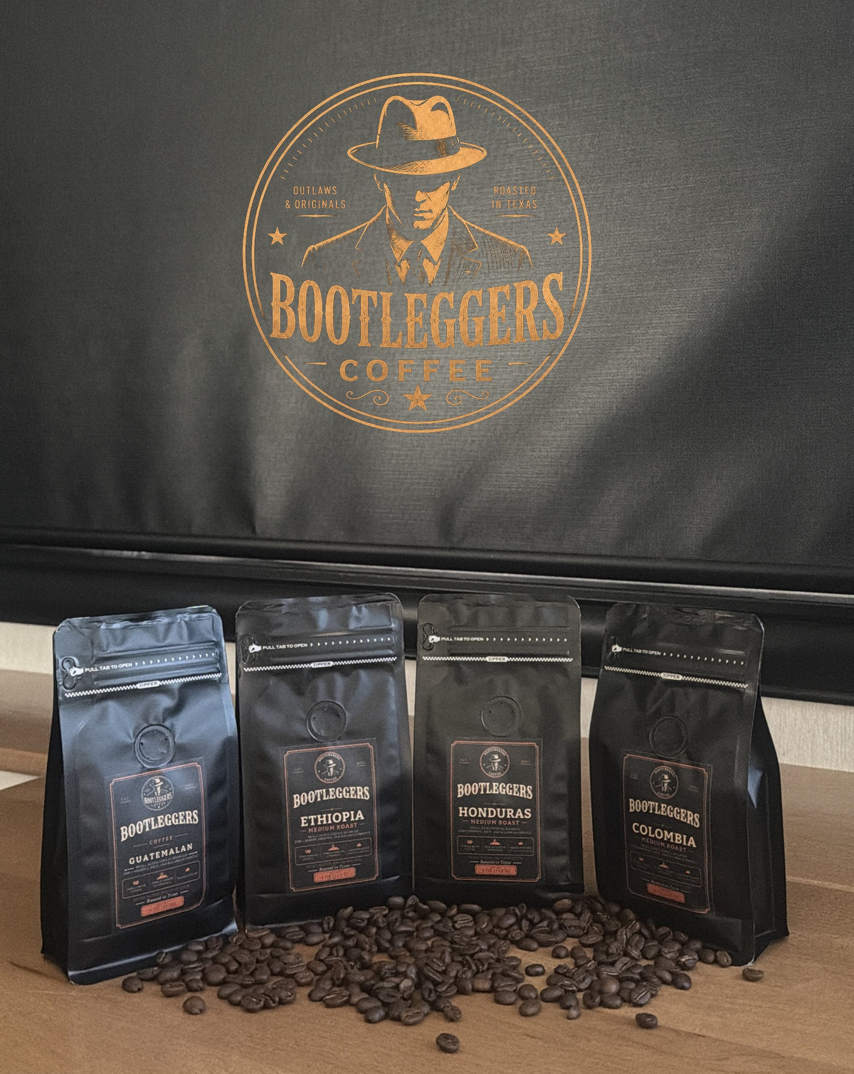 Bootleggers Coffee Medium Roast Flight: 4 oz bags of Guatemalan, Ethiopia, Honduras and Colombia with coffee beans